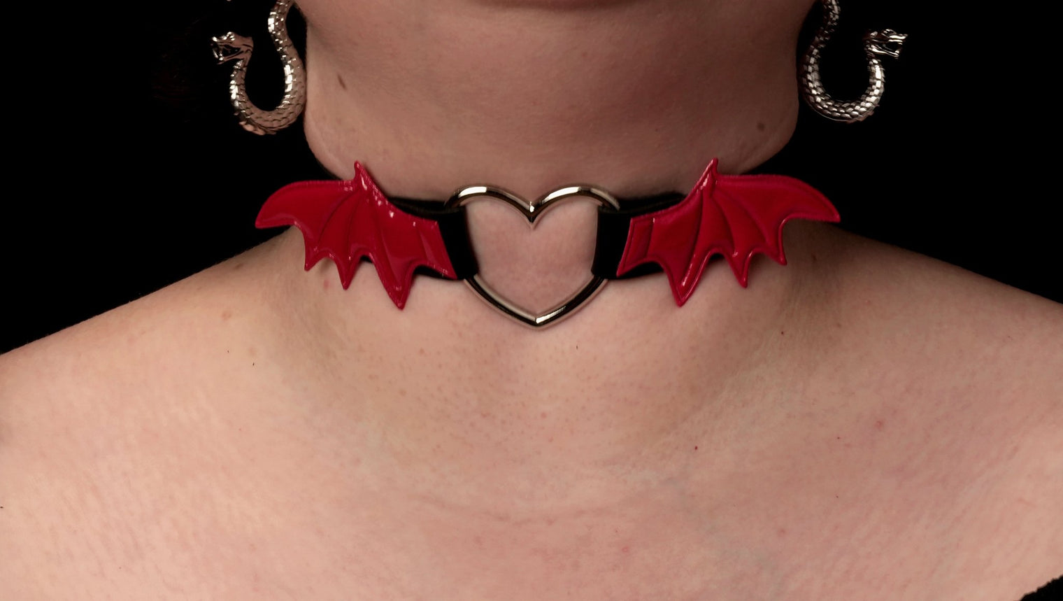 Close-up of Leather Choker with Red Bat Wings showcasing intricate bat wing design and gothic details
