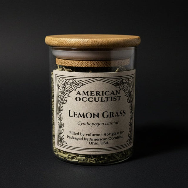 Dried cut-and-sifted lemongrass (Cymbopogon citratus) in a labeled glass ritual herb jar