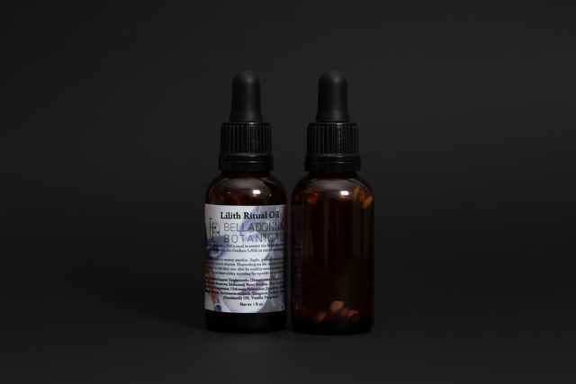 Lilith oil in a bottle with a dropper on a black background,