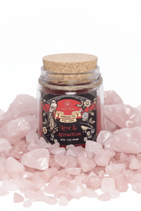 Jar of rose petals with a label on pink stones