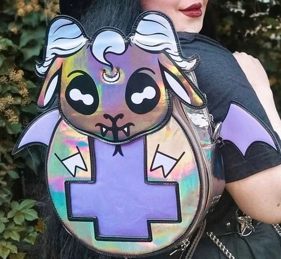 Person holding a colorful, cartoonish bag with animal design