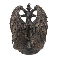 Bronze angel figurine with detailed wings on a white background