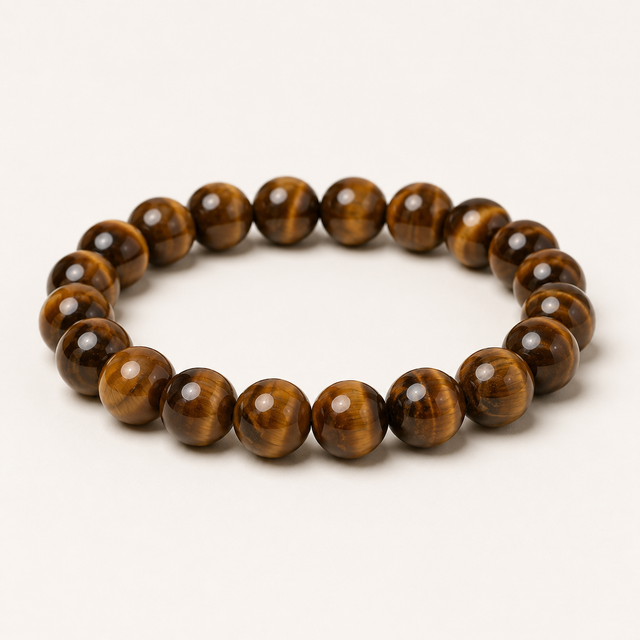 Polished round mixed tiger eye beaded stretch bracelet with gold, red, and blue chatoyant tones.