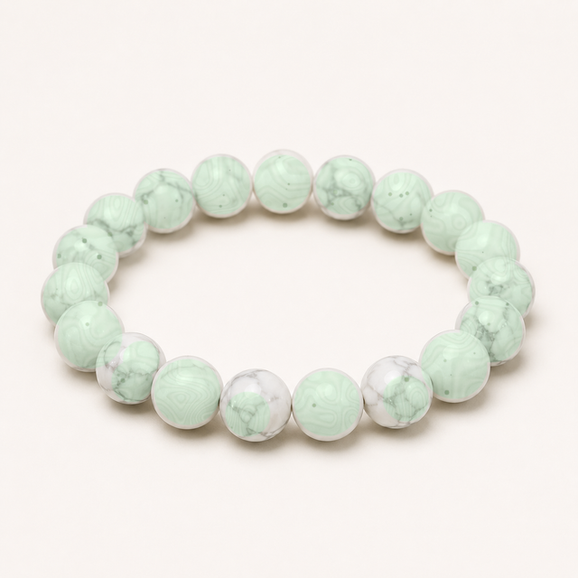 Representative bracelet sold as Moss Agate for Bangle 1 or Bangle 2 selection; material identity, inclusions, treatment, bead arrangement, dimensions, fit, and condition vary