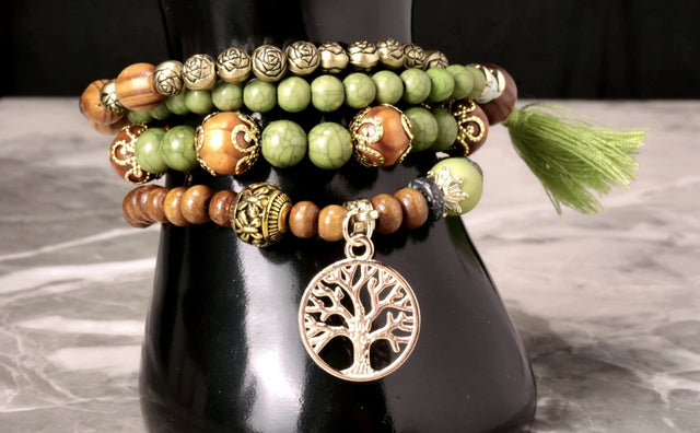 Close-up of Multi-Layered Beaded Bracelet with Tree of Life Charm showcasing natural beads and detailed Tree of Life symbol
