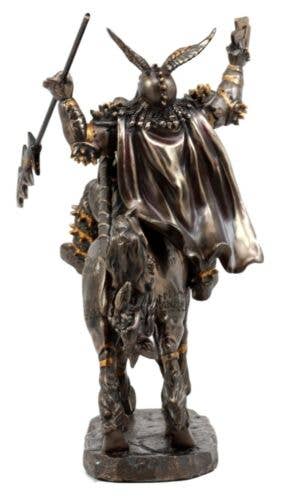 Bronze statue of a warrior on horseback with a white background