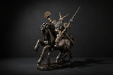 Statue of a warrior on horseback with armor and weapons on a white background