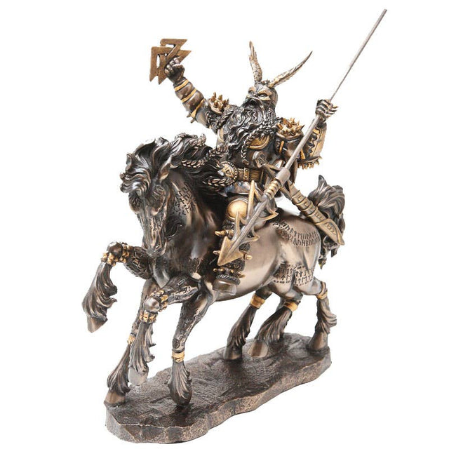 Statue of a warrior on horseback with armor and weapons on a white background