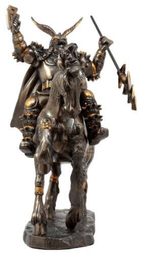 Statue of a warrior on a horse with detailed armor and weapons on a white background