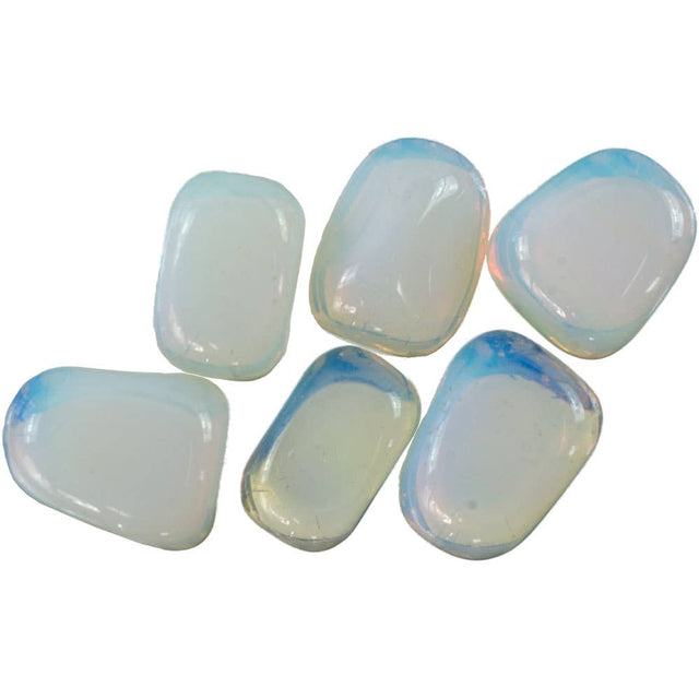 Set of six opal stones on a white background