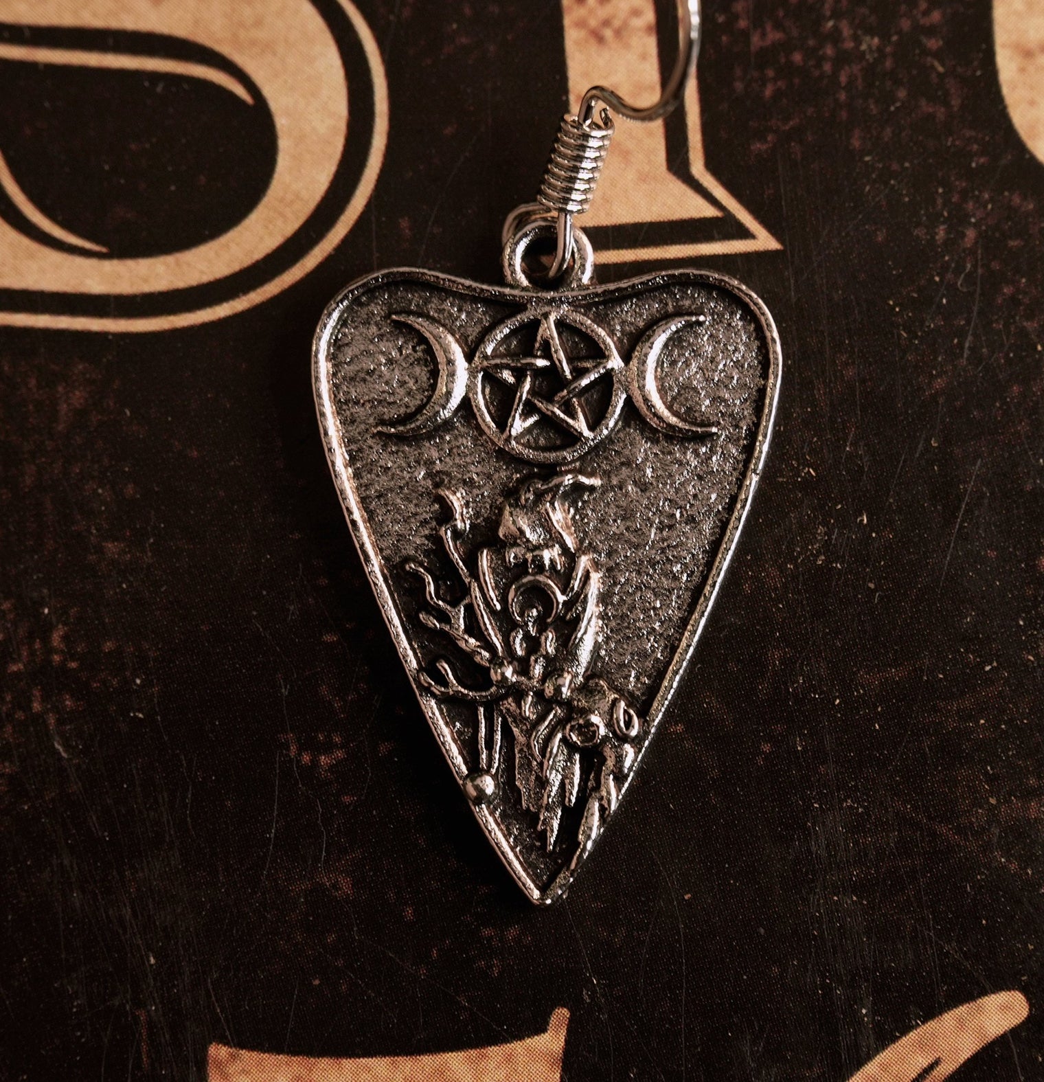 close up planchette earring