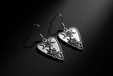 Pendant planchette earrings with crescent moon and crow charms