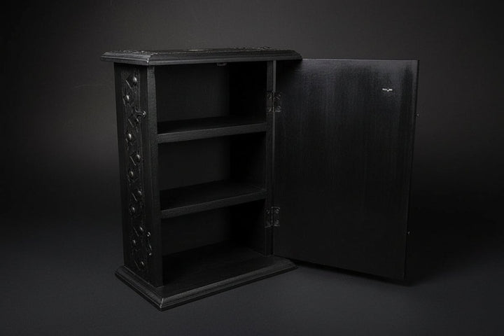 Wooden cabinet showing carved pentacle and cross details