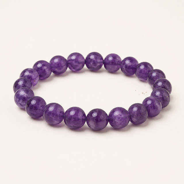 Polished round purple garden quartz beaded bracelet with violet tones and earthy internal inclusions.