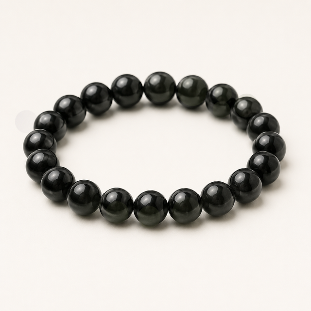 Polished round rainbow obsidian beaded stretch bracelet with black stone and subtle multicolor sheen.