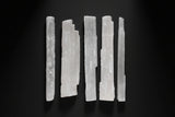 Long raw satin spar gypsum wand commonly sold as selenite, approximately 10 to 13 inches