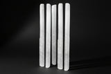 Raw white satin spar gypsum wands measuring approximately 4 to 7 inches