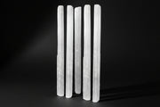 Raw white satin spar gypsum wands measuring approximately 4 to 7 inches