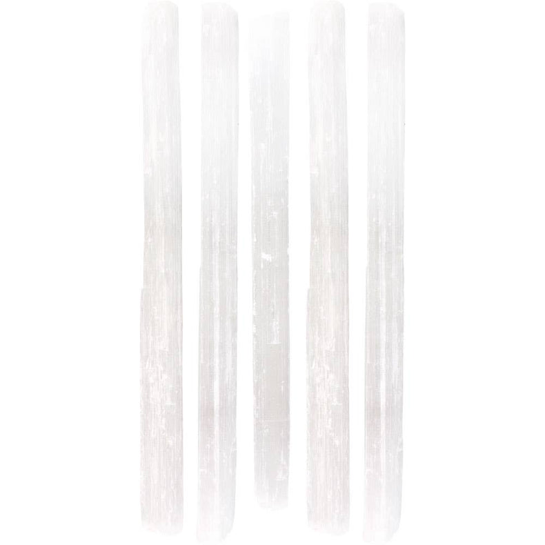 White vertical selenite wands on a white background