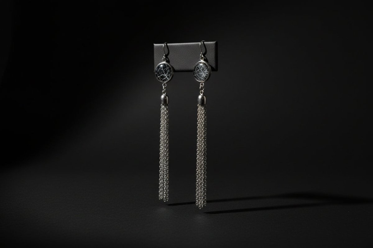Long chain earrings containing preserved natural spiderweb