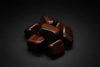 Polished red-brown Tiger Eye tumbled stones with chatoyant banding