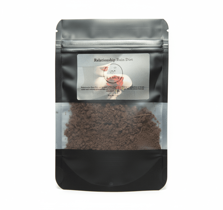 Black coffee bag with visible coffee grounds and a label on a white background