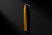 Gold candle on a white background
