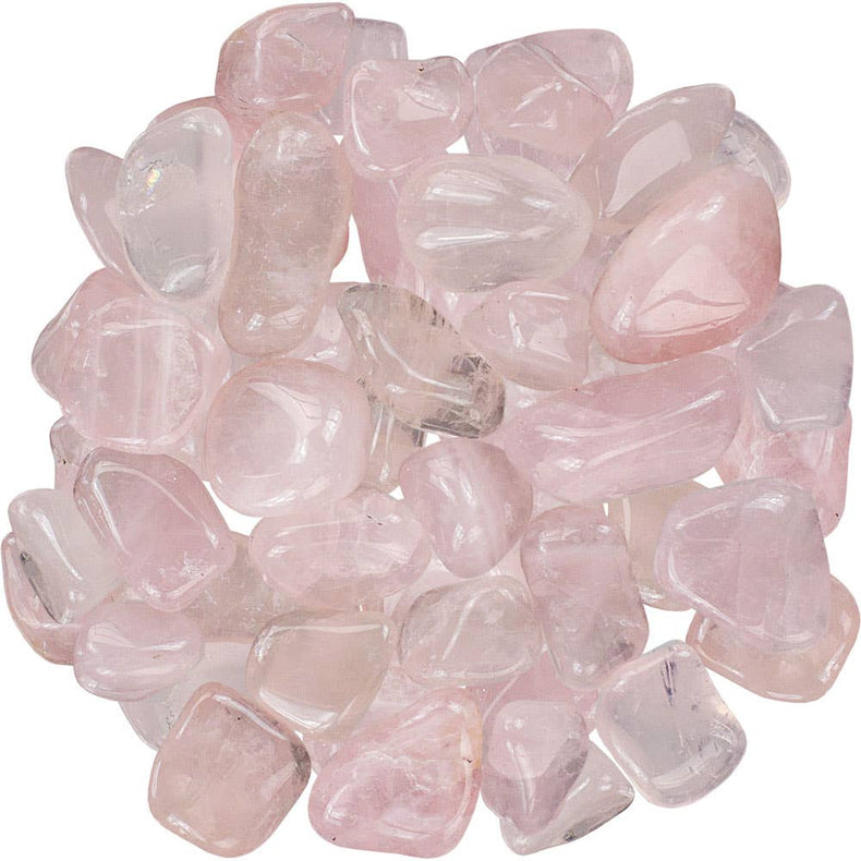 Pink tumbled stones on a white background