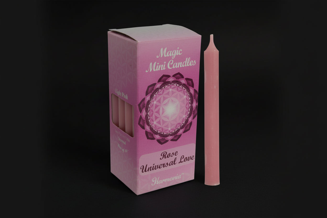 Rose-scented pink chime candle in retail packaging on a white background