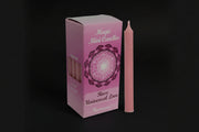 Rose-scented pink chime candle in retail packaging on a white background