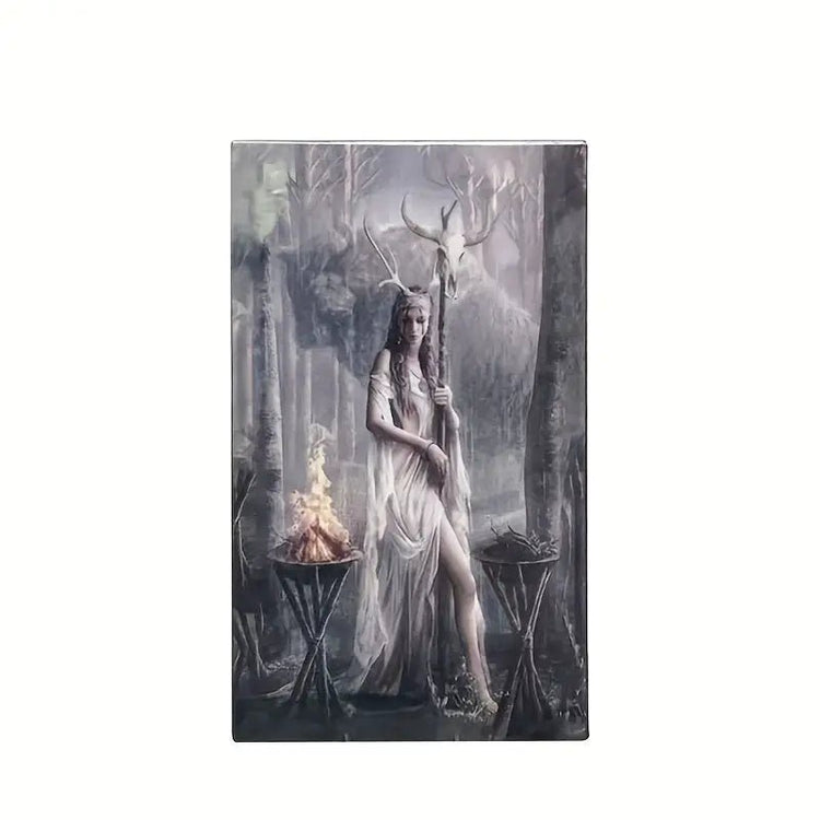 Framed artwork of a woman with antlers in a forest setting