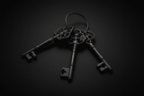 Three rustic cast iron skeleton keys with vintage finish