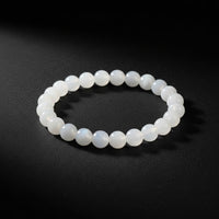 Polished satin spar gypsum beaded stretch bracelet commonly sold as selenite