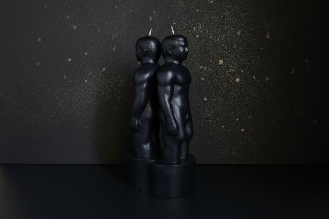 Black separation ritual candle shaped as two joined figures