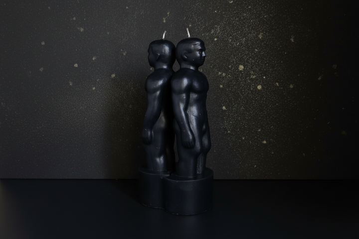 Black separation ritual candle shaped as two joined figures