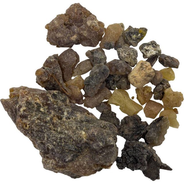 Collection of various colors of palo santo resin on a white background