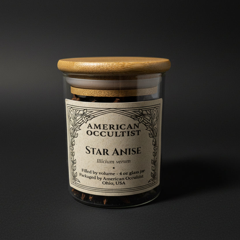 Whole dried star anise fruits (Illicium verum) in a labeled glass ritual herb jar