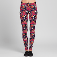 Colorful patterned leggings on a plain background