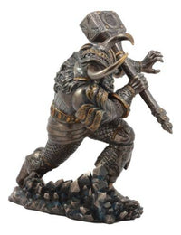 Statue of a warrior holding a hammer on a white background