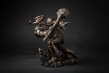 Thor statue holding Mjölnir in a Norse warrior design