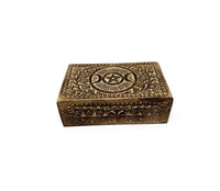 Decorative wooden box with intricate carvings and a central symbol on a white background