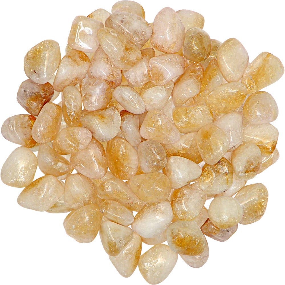 Pile of small, round, beige stones on a white background