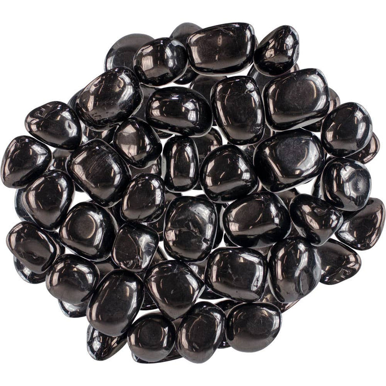 Black pebbles on a white background