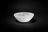 Carved white satin spar gypsum bowl for dry display