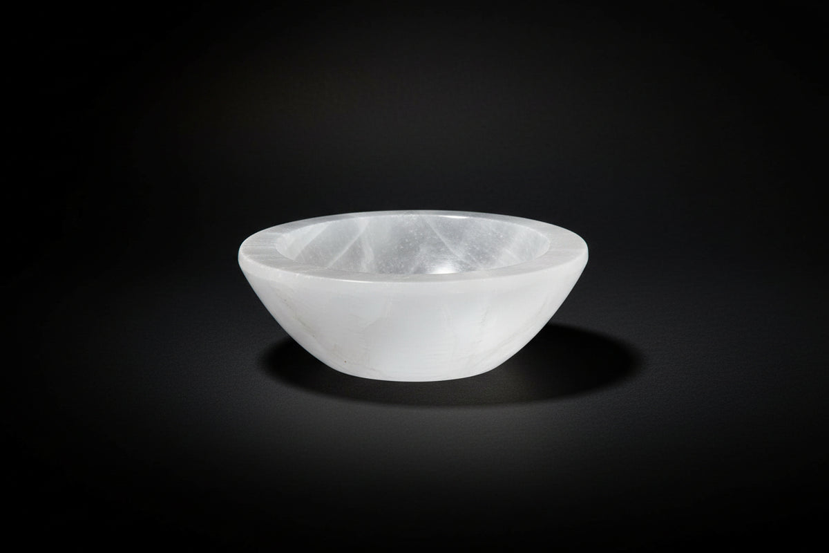 Carved white satin spar gypsum bowl for dry display