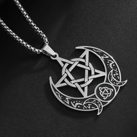 Silver pentacle and crescent moon pendant on a black background
