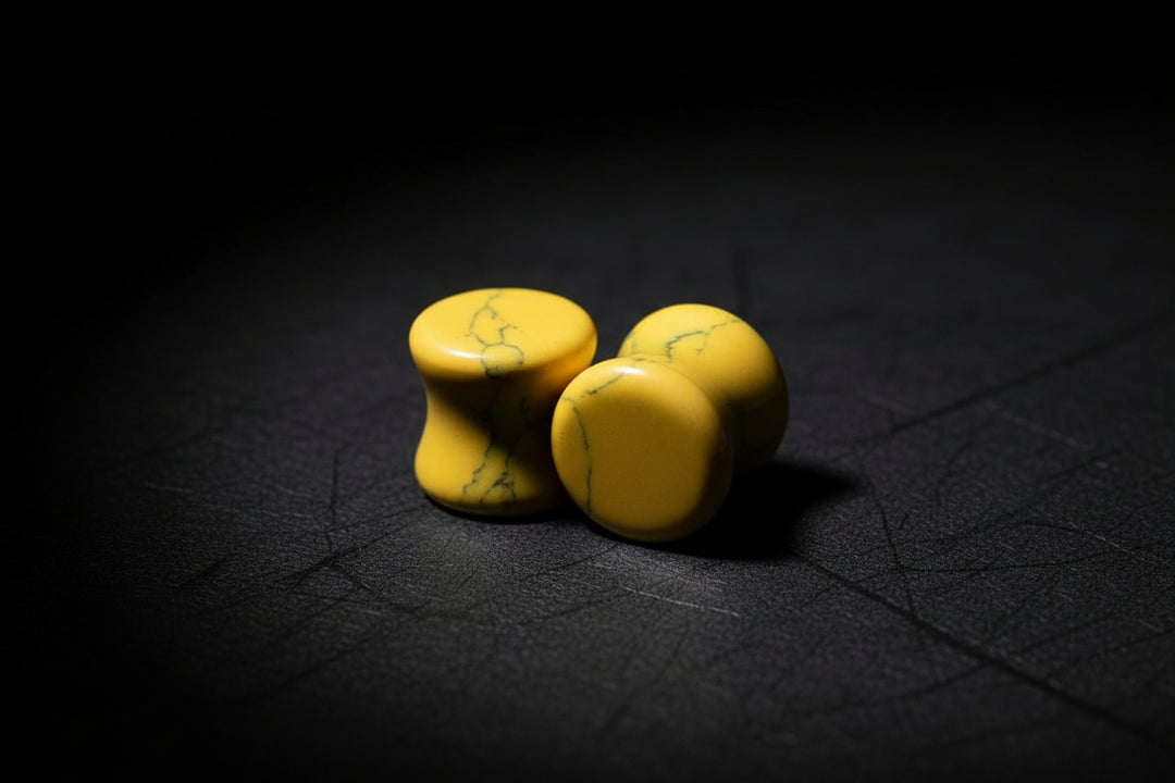 Pair of yellow howlite double-flare stone plugs