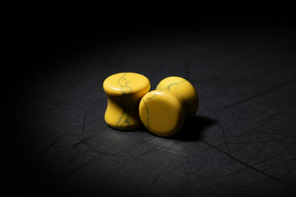 Pair of yellow howlite double-flare stone plugs